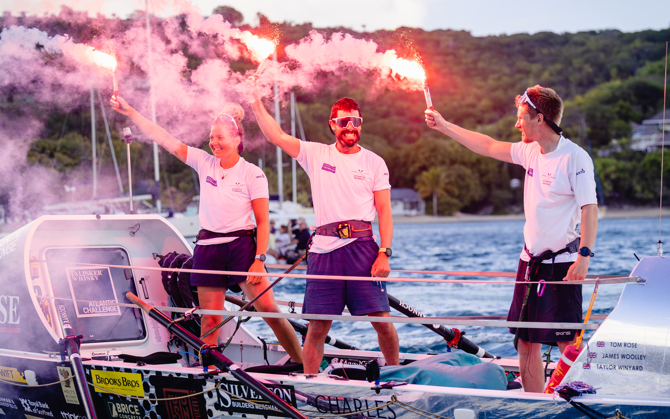Atlantic Nomads celebrating finishing their rowing challenge